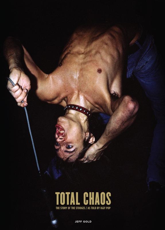 an upside down photograph of Iggy Pop shirtless and holding a microphone