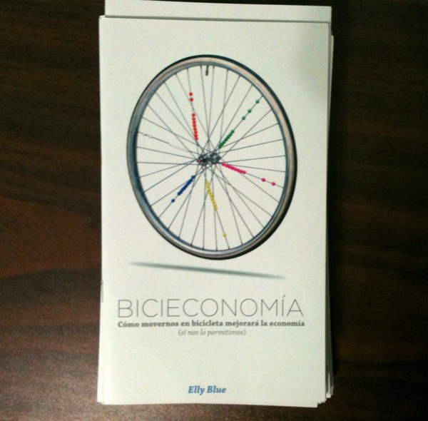 zine cover featuring a colorful bicycle wheel