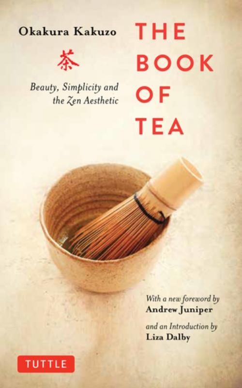 a Japanese teacup and brush.