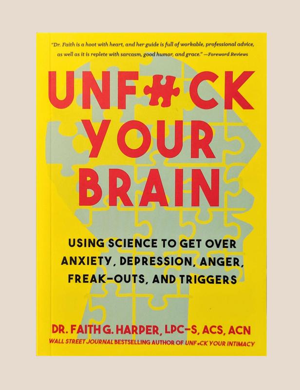 the yellow Unfuck Your Brain book cover with a head held together by puzzle pieces
