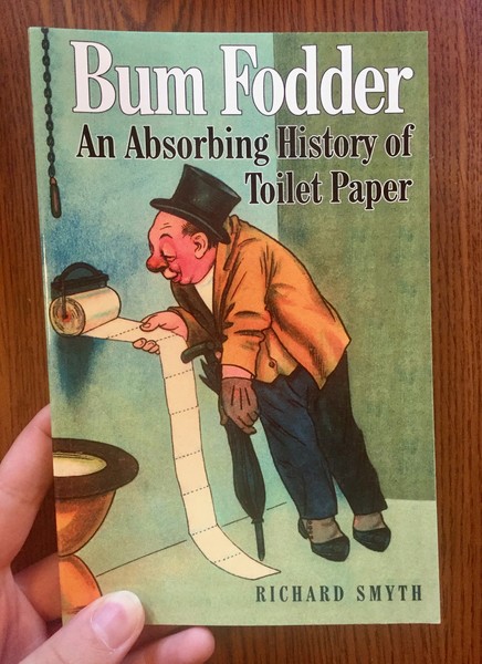 Bum Fodder: An Absorbing History of Toilet Paper by Richard Smythe [A drunk British chaps stares at some bog roll]