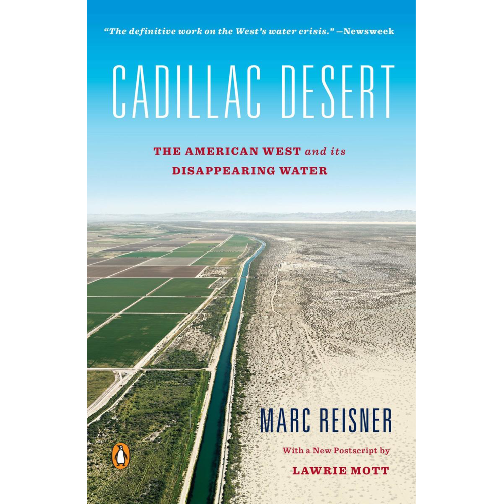 a river divides farmland from desert