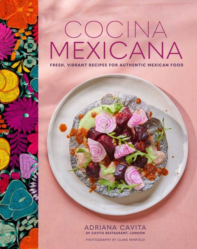 pink cover with colorful spine with close up of a plate with food 