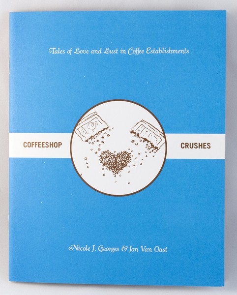 A blue zine with an illustration of coffee beans poured into a heart shape