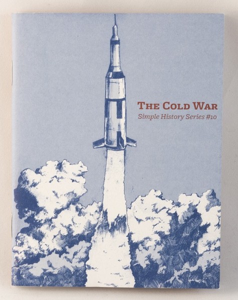 A zine with an illustration of a rocket lifting off