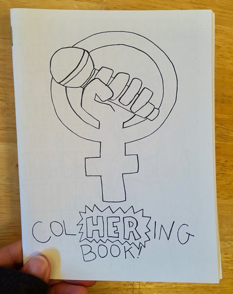Cover of Col HERing Book! by Ms. Daggermouth [The woman symbol is clutching a mic--perhaps to sing, perhaps poising for the ultimate mic drop]