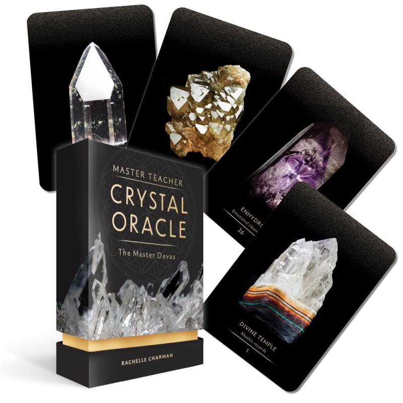 a box with four cards - all have glowing crystals on black backgrounds