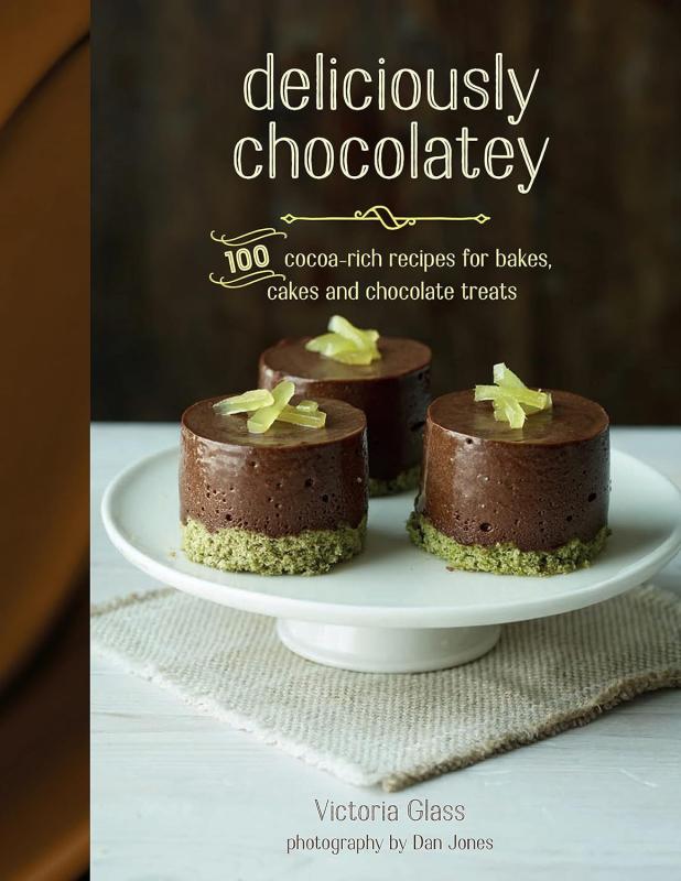 brown cover with white table with a plate of chocolate cakes withe white text