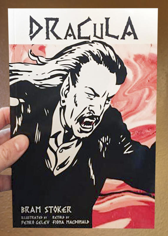 a black and white rendering of Dracula with red, blood-stained fangs. The background appears to be a shifting pool of blood)