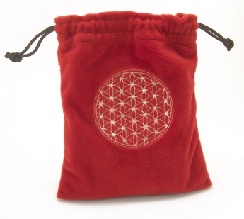 a red drawstring bag with the flower of life symbol on it.