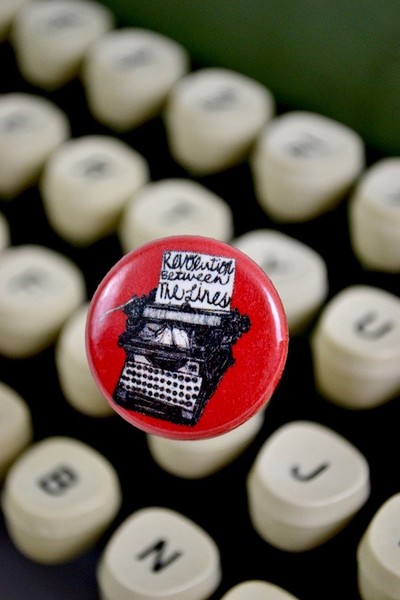Typewriter button revolution between lines