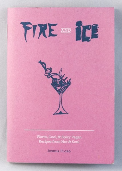 A pink zine with an illustration of a cocktail on fire