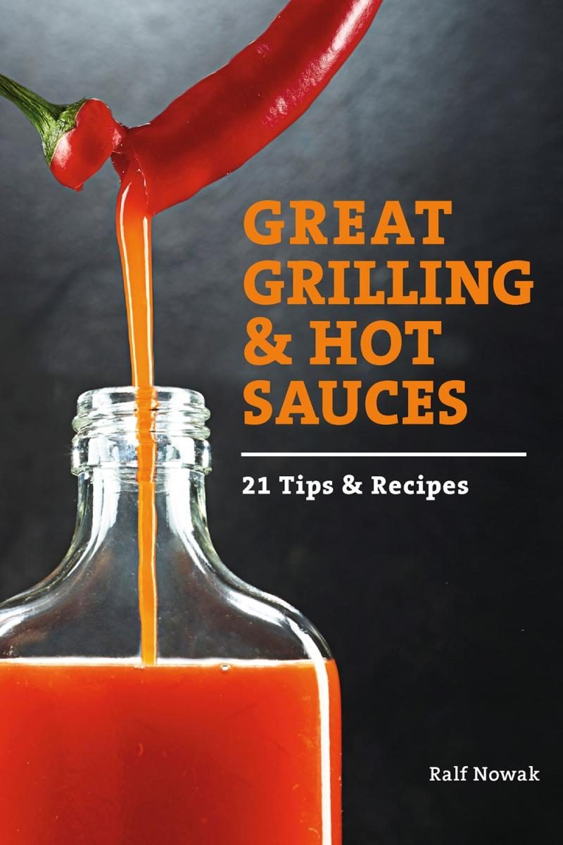 black cover with orange text and a bottle with bright orange liquid being poured into it