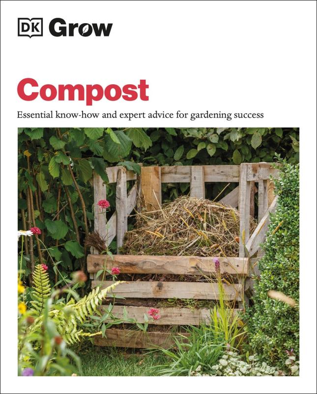 A wooden structure in a garden filled with compost.