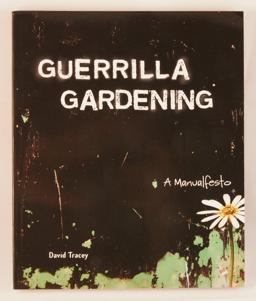 Guerrilla Gardening: A Manualfesto - black background - daisies at the bottom right 