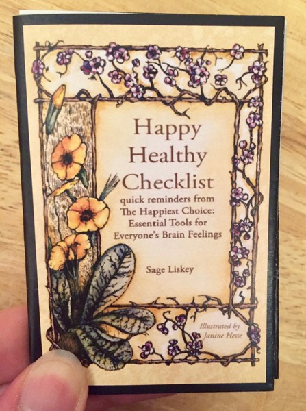 Cover of Happy Healthy Checklist which has the title framed by drawings of various flowers