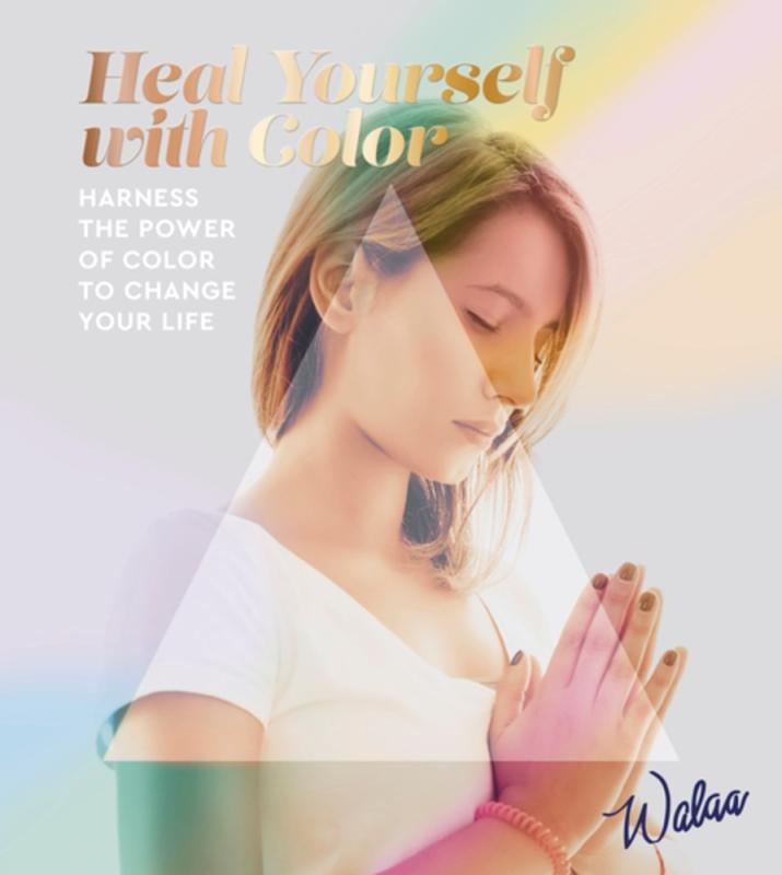 light rainbow effect over a person with hands together with gold text