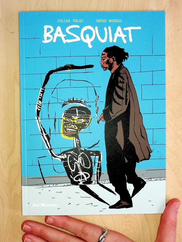 A cartoon drawing of Jean-Michel Basquiat walking past a blue building. His shadow on the wall looks like a skeleton