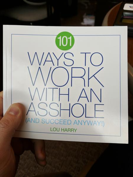 101 Ways to Work With an Asshole (And Succeed Anyway) by Lou Harry (A white cover page with blue and green lettering)