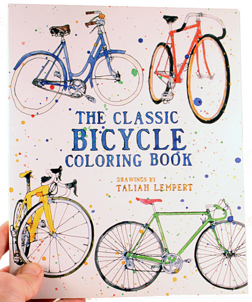 Several colorful bikes adorn the cover against a white backroung with paint-like blots all over