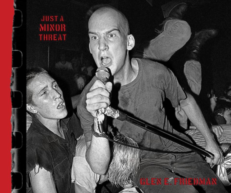 a black and white photograph of the band Minor Threat