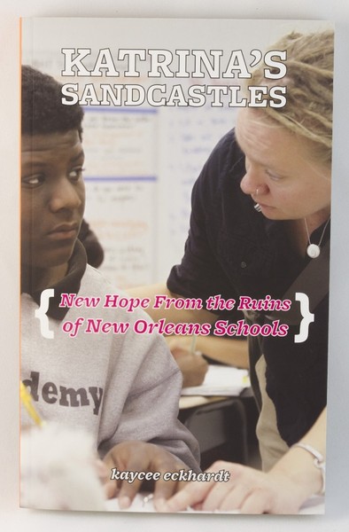 A book cover with a photo of a teacher mentoring a student