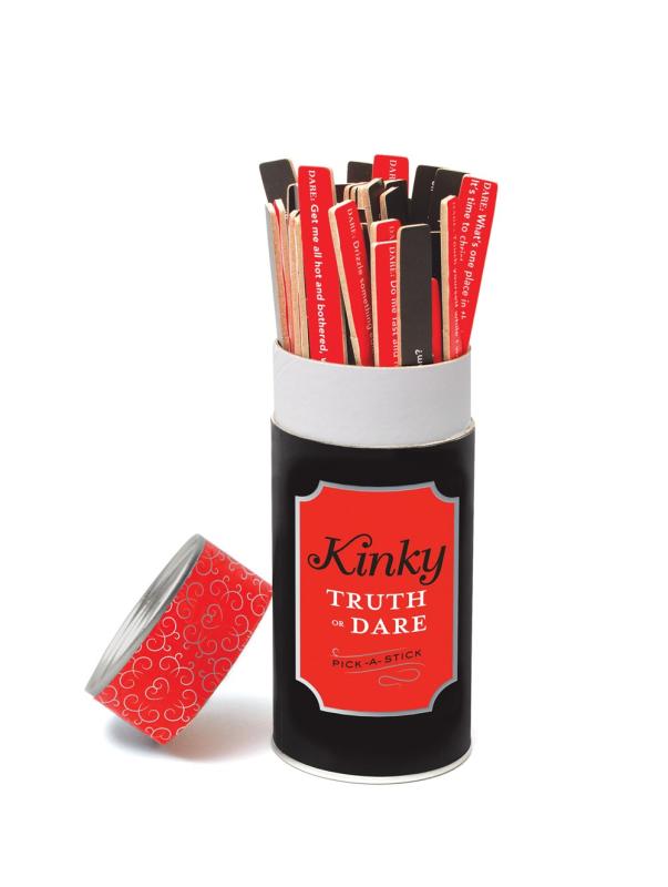 a cylinder full of red and black sticks with prompts written on them