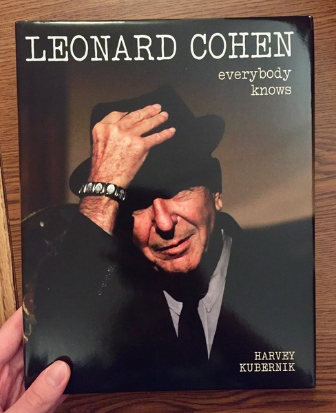 Cover of Leonard Cohen: Everybody Knows  [Leonard Cohen politely doffs his hat]