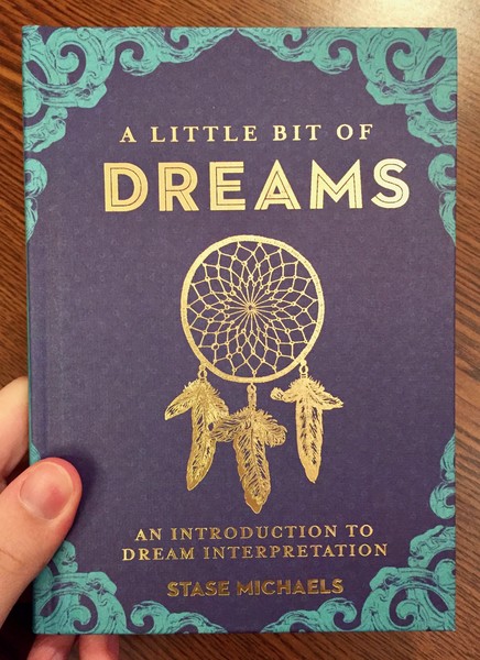 Cover of A Little Bit of Dreams: An Introduction to Dream Interpretation [Golden Dreamcatcher on a blue background]