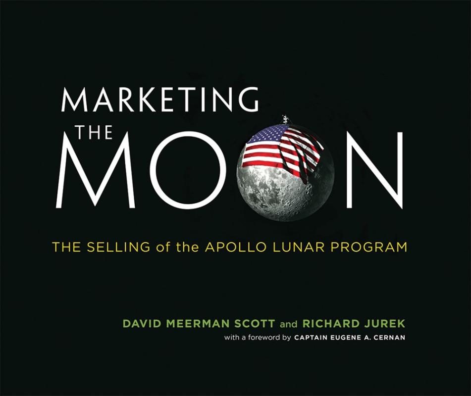 black cover with think large font with the moon with an american flag draped on it