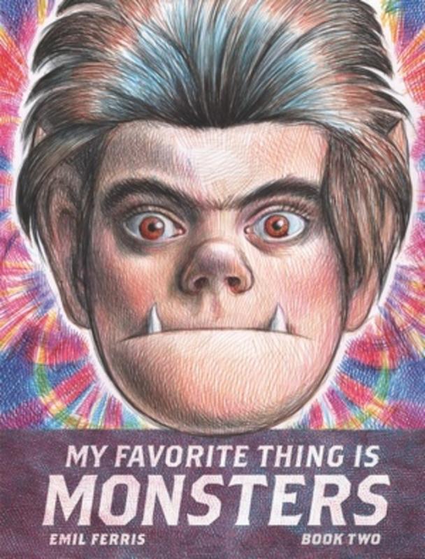 Colorful book cover featuring large face of a monster boy with fangs.