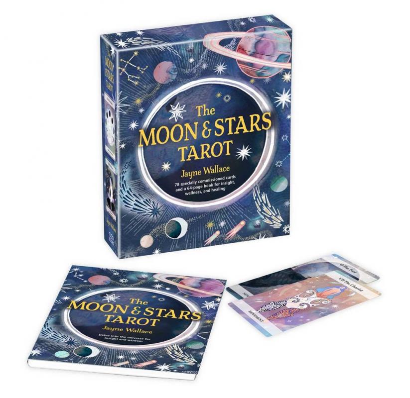 a pack of cards covered in stars and moon shapes, a guidebook with the same pattern and two loose cards