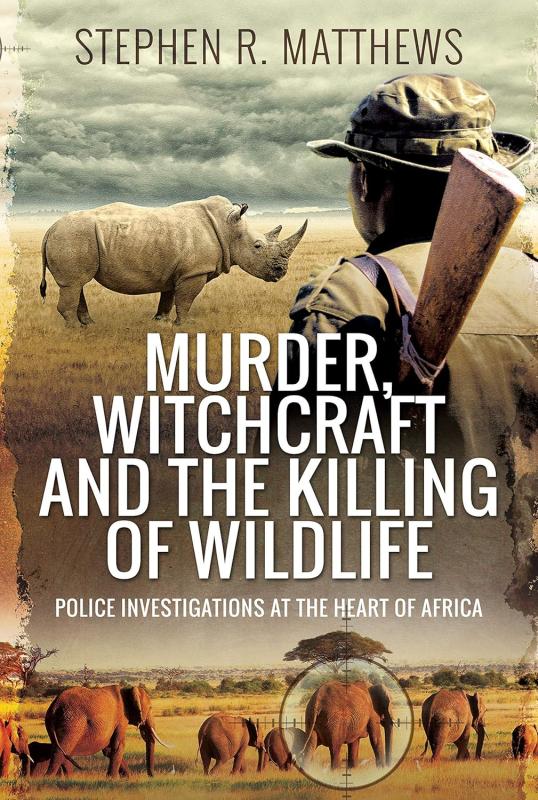 image of a hunter looking at a rhino with elephants in crosshairs at the foot of the cover