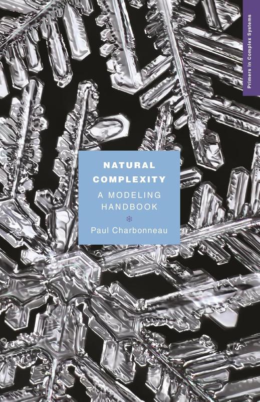 black cover with white close up of snow flakes with blue box with white text