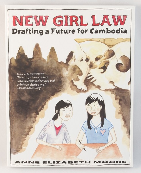 Book cover with an illustration of two girls writing at a table, surrounded by brown water colors and skulls