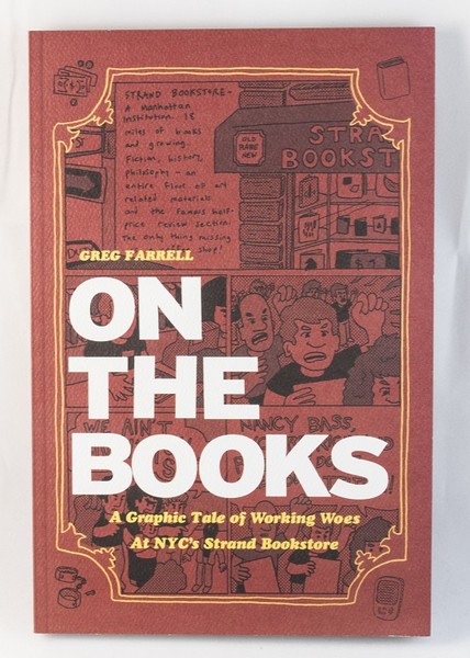 A red book with an illustration of Strand Bookstore and unhappy people