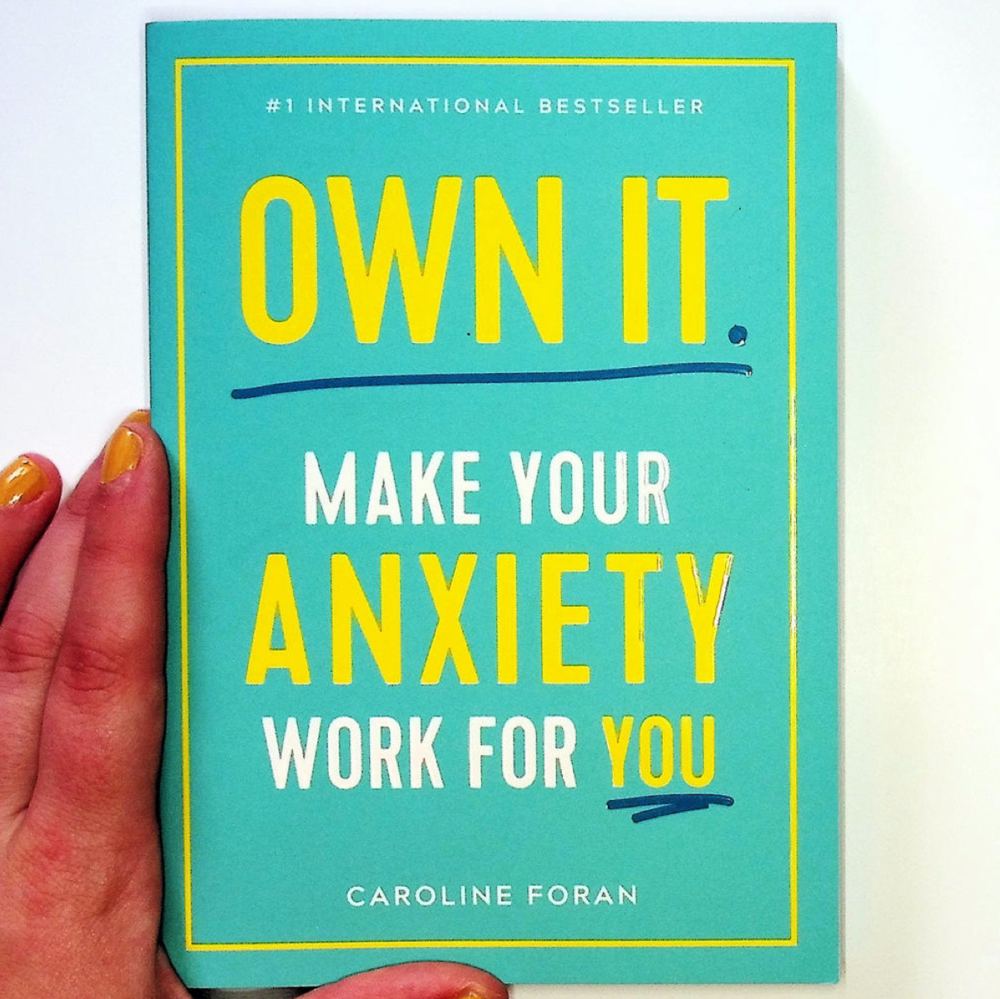 Blue cover, yellow text that reads: Own it make your anxiety work for you