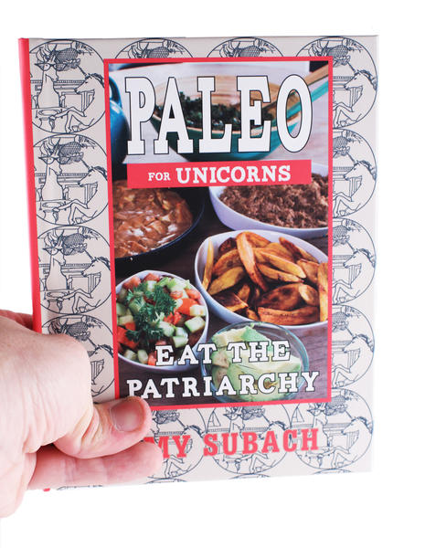Cover for Paleo for Unicorns: Eat the Patriarchy, which features several paleo dishes in white bowls 