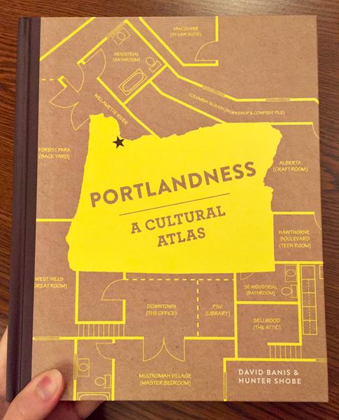 A brown and yellow book cover with a map motif and the State of Oregon outlined in the center