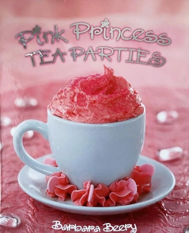 Cover with photo of a tea cup on a pink tablecloth