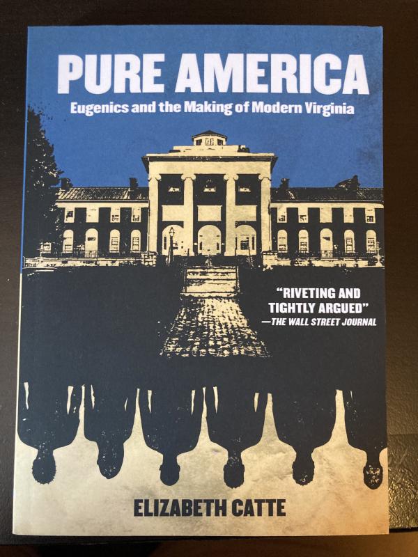 five silhouettes of people  at the bottom of the cover and a colonial building