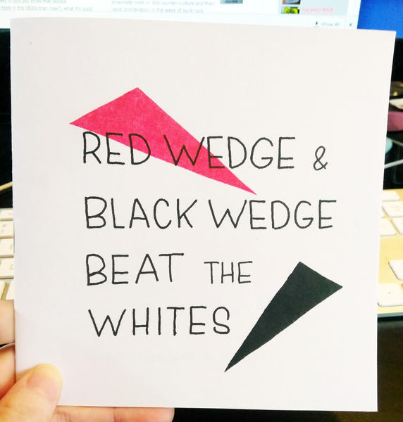 Cover of Red Wedge and Black Wedge Beat the Whites which features a red and black triangle.