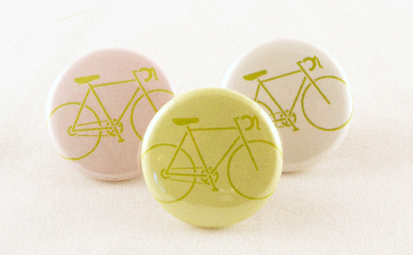 buttons with a road bike image