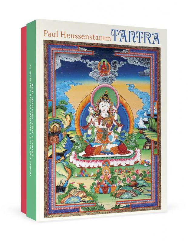 a colorful painting of a cross-legged buddha on the cover of a box