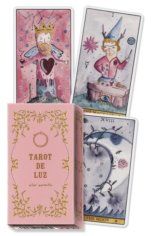 a pink deck box with a floral theme and gold lettering, and three cards illustrated in watercolor in a simple and childlike style