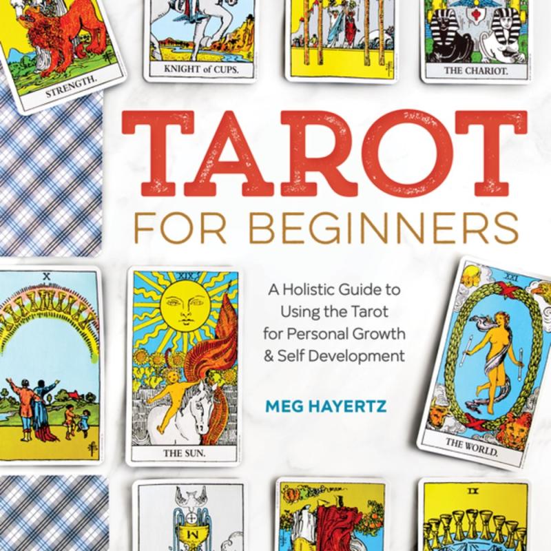 various tarot cards arranged on the cover, with some flipped over