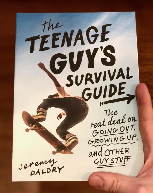 White cover with a photo of teenage boy doing a skateboarding trick. (UK printing.)