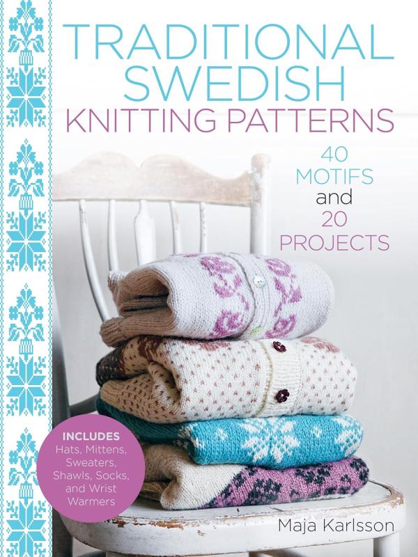 white cover with chair full of sweaters and cardigans