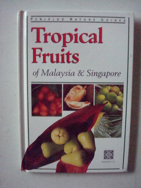 white cover with red text with close up of various fruits