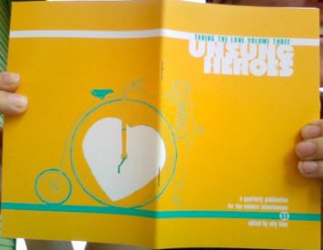 Taking the Lane 3: Unsung Heroes, unfolded zine cover with pennyfarthing